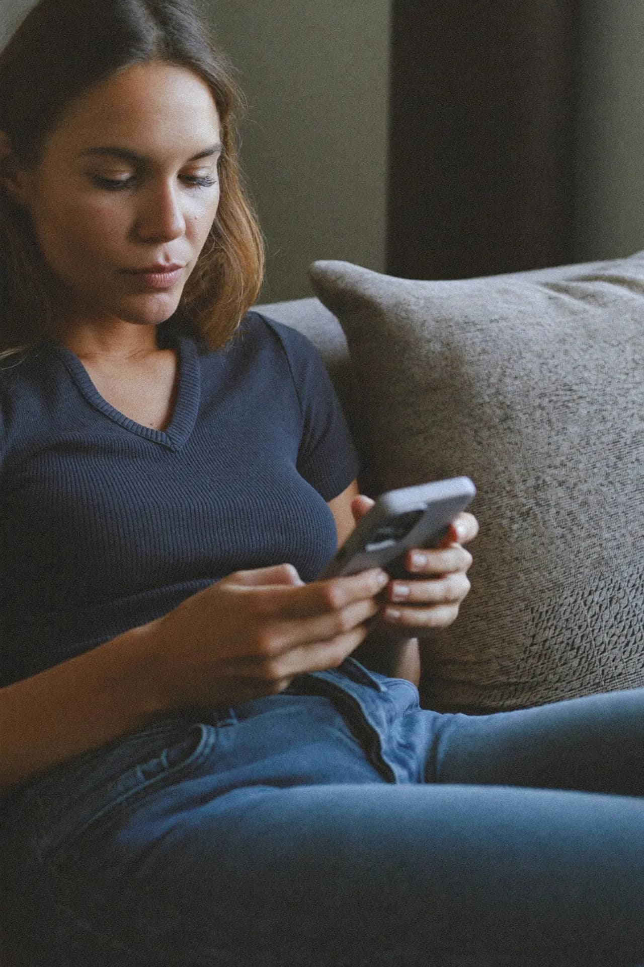 A patient completing the Apex intake on her phone at home